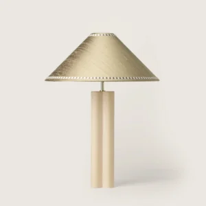 Elegant table lamp with a gray shade, ribbon, and a cream base.